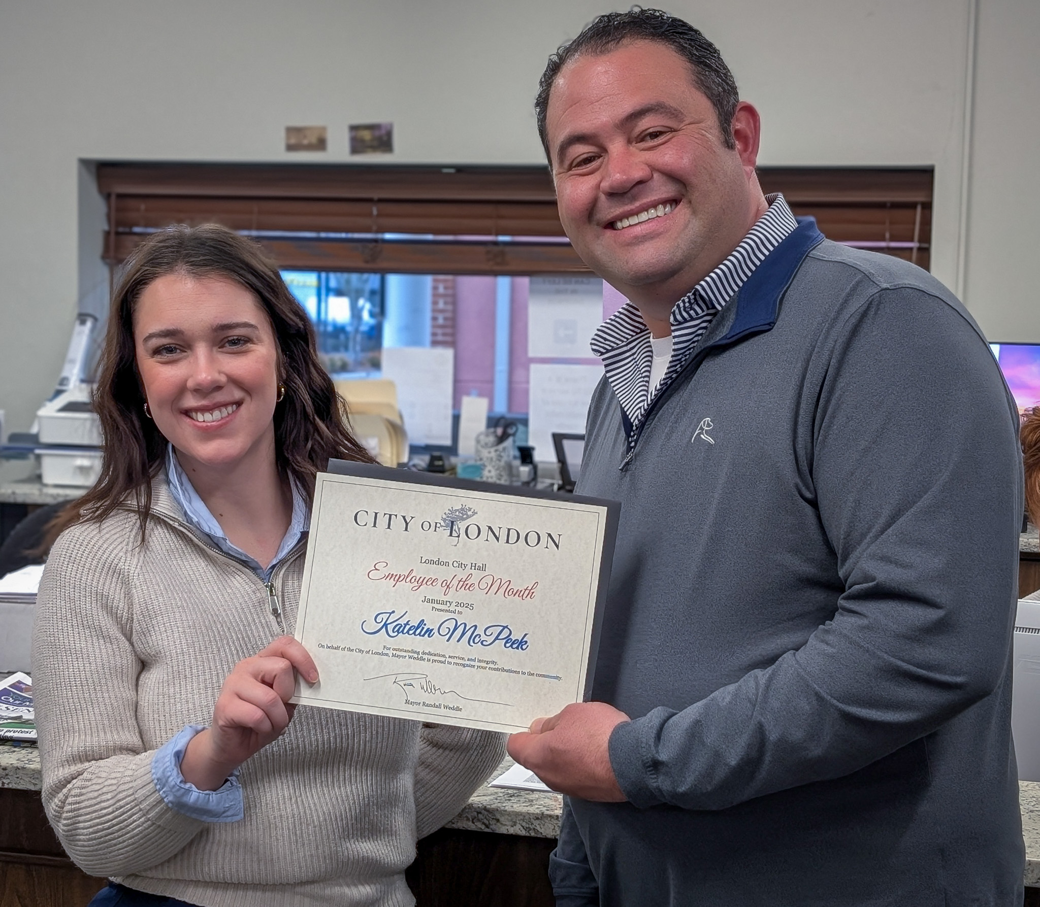 Mayor Weddle presenting January Employee of the Month to City Clerk Katie McPeek